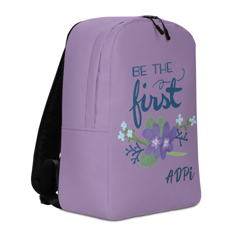 Your Alpha purple Alpha Delta Pi backpack with the "Be The First" motto on the front.