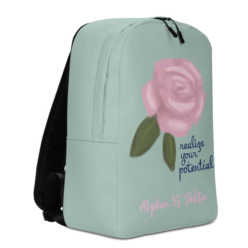 Alpha Xi Delta Realize Your Potential Green Backpack showing side of backpack