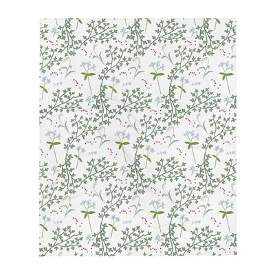 Alpha Phi throw blanket is a soft silk touch printed on one side with ivy leaves and lily of the valley on a white background.
