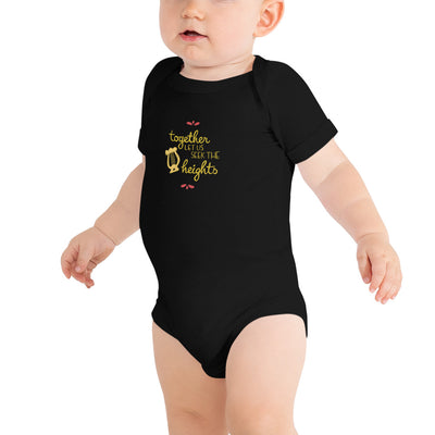 Alpha Chi Omega Baby Onesie shown on child model n black