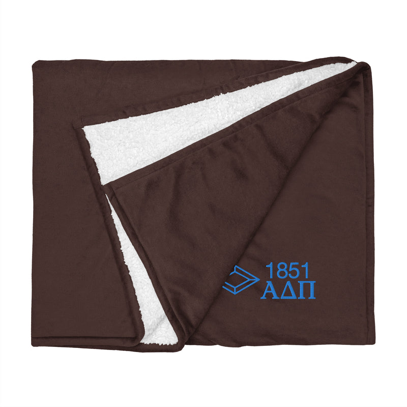 Alpha Delta Pi Plush Embroidered Sherpa Blanket in brown with blue letters 