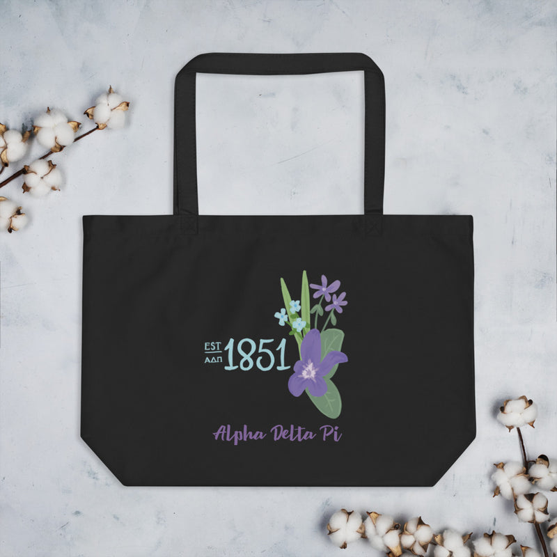 Alpha Delta Pi Sorority Tote Bag in black shown with cotton blossoms