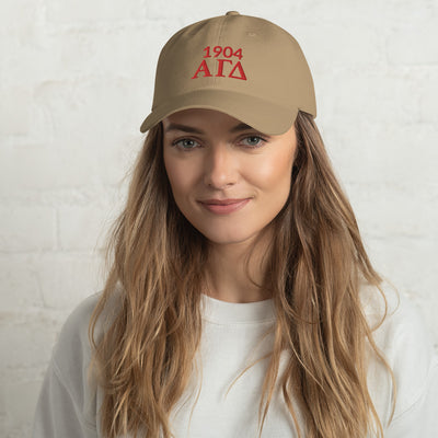 Alpha Gamma Delta Sorority Baseball Cap in khaki on model