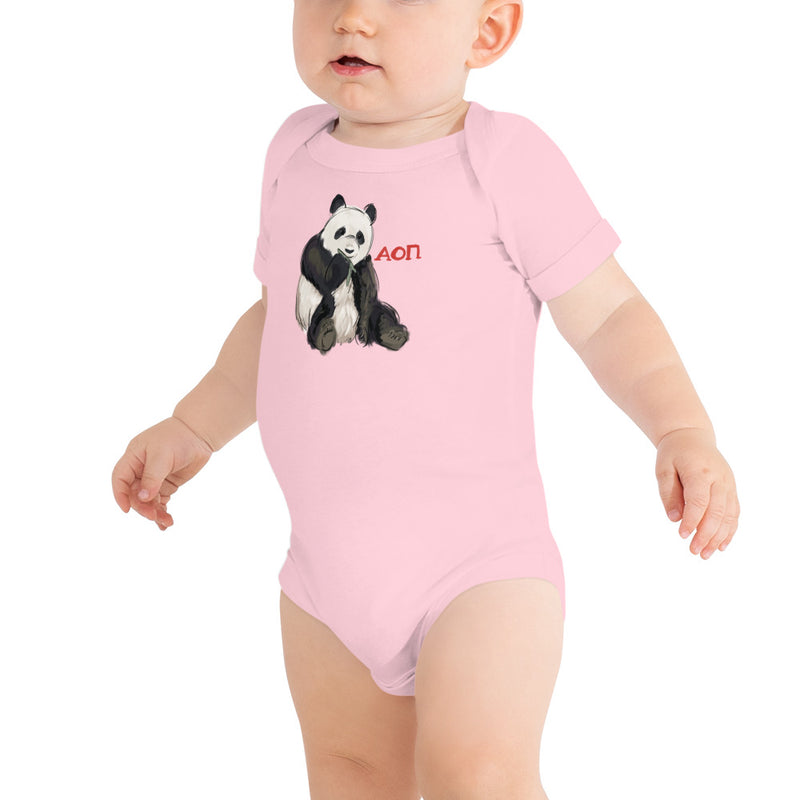 Alpha Omicron Pi Panda Baby Onesie in pink on baby model showing panda mascot