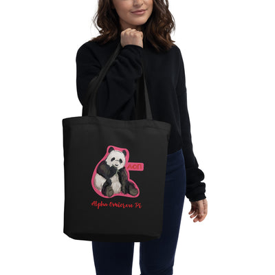 Alpha Omicron Pi Sorority Tote Bag with panda design on model's arm