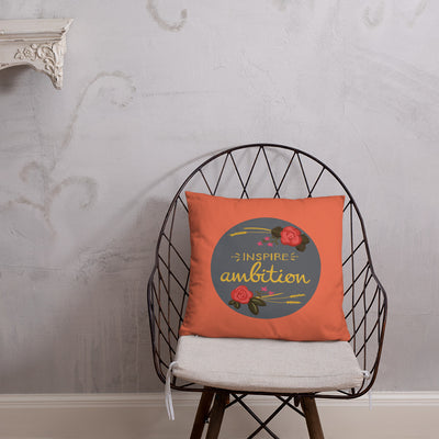Alpha Omicron Pi Inspire Ambition Coral Pillow shown on chair
