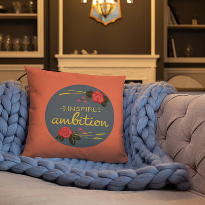 Alpha Omicron Pi Inspire Ambition Coral Pillow shown on couch
