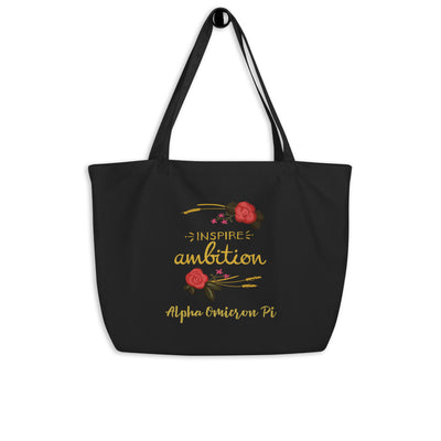 Alpha Omicron Pi Sorority Tote Bag in black shown on a hook with motto design