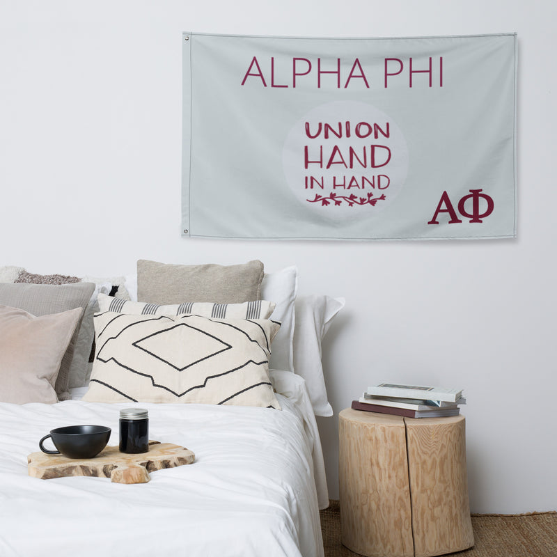 Alpha Phi Sorority Flag in Silver and Bordeaux shown in bedroom setting