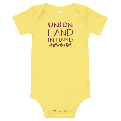 Alpha Phi "Union Hand in Hand" baby onesie in yellow