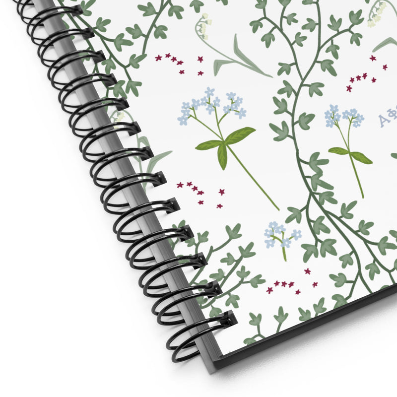 Alpha Phi Sorority Notebook in white with A Phi floral print in detail view