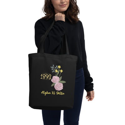 Alpha Xi Delta 1893 Founders Day Eco Tote Bag in black shown on model's arm