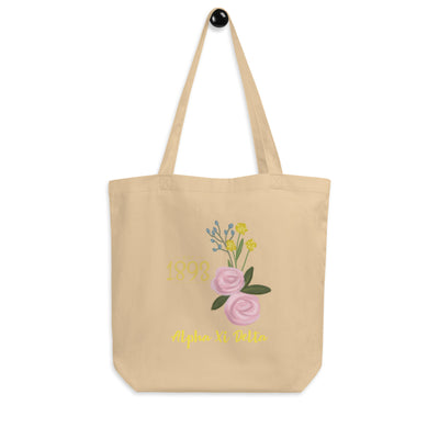 Alpha Xi Delta 1893 Founders Day Eco Tote Bag in natural oyster shown on a hook