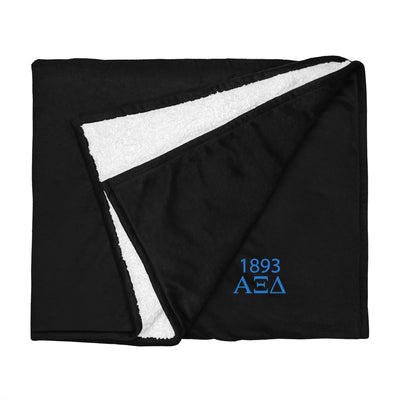 Alpha Xi Delta Plush Sherpa Blanket in black shown flat