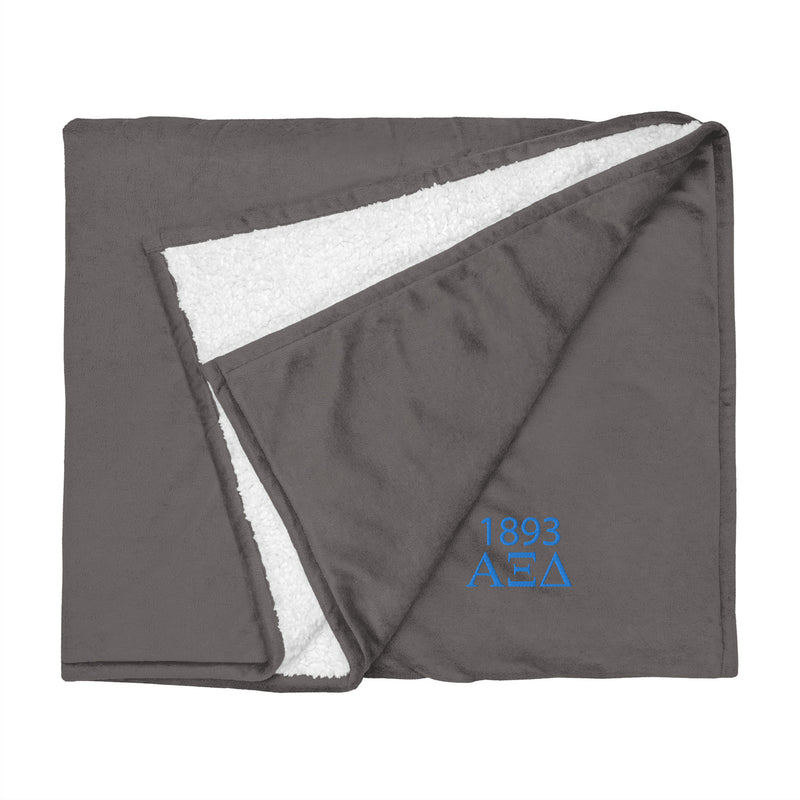 Alpha Xi Delta Plush Sherpa Blanket in gray shown flat