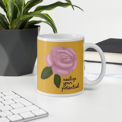 Alpha Xi Delta Realize Your Potential Gold Mug in 11 oz size shown in office