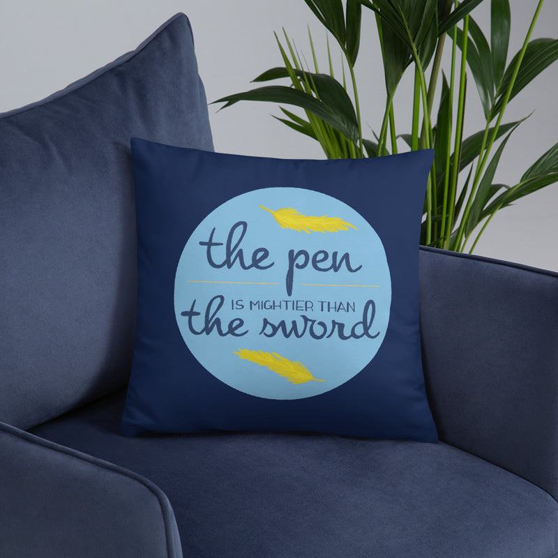 Alpha Xi Delta The Pen Is Mightier Than the Sword Pillow shown on chair