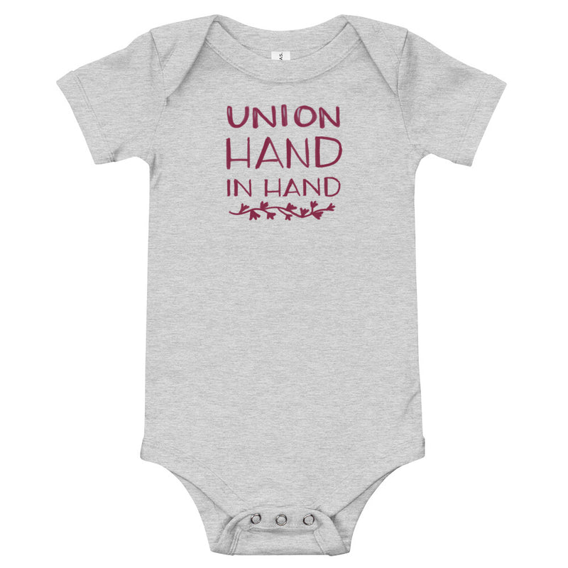 Alpha Phi "Union Hand in Hand" baby onesie in Athletic Heather gray