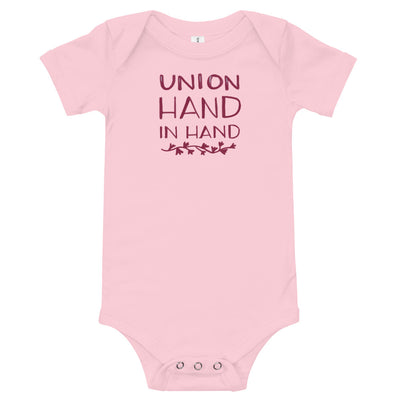 Alpha Phi "Union Hand in Hand" baby onesie in pink