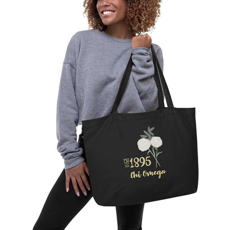 Chi Omega 1895 Founders Day Large Organic Tote Bag in black on model&