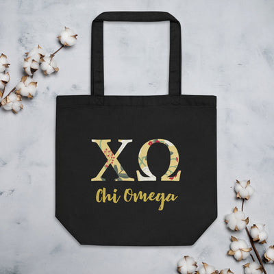 Chi Omega Sorority Tote Bag in black shown flat with cotton blossoms