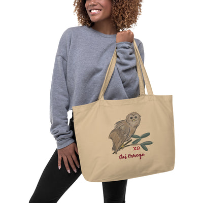 Chi Omega Owl Mascot Large Organic Eco Tote Bag in natural oyster on model