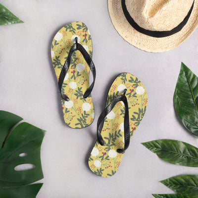 Chi Omega Sorority Flip-Flops in floral print in straw gold shown in lifestyle setting