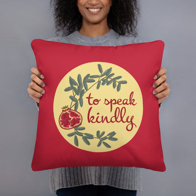 Chi Omega To Speak Kindly Pillow in model's hands