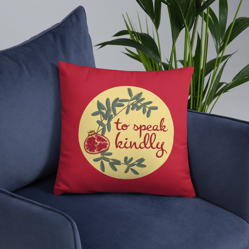 Chi Omega To Speak Kindly Pillow shown on blue chair