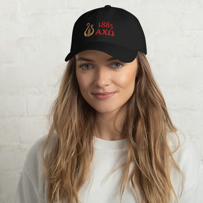 Alpha Chi Omega 1885 Lyre Baseball Hat in black with red and gold embroidery