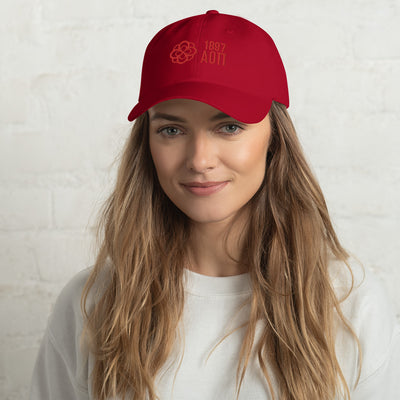 Alpha Omicron Pi 1897 Founding Year Baseball Hat in cranberry red on model's head