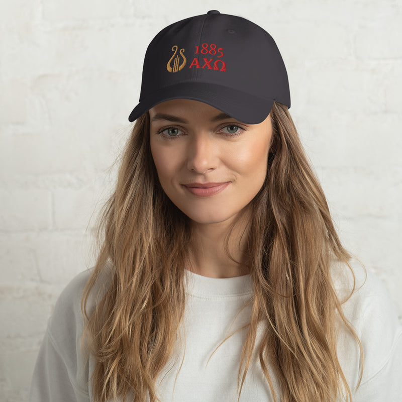 Alpha Chi Omega 1885 Lyre Baseball Hat in dark gray with red and gold embroidery