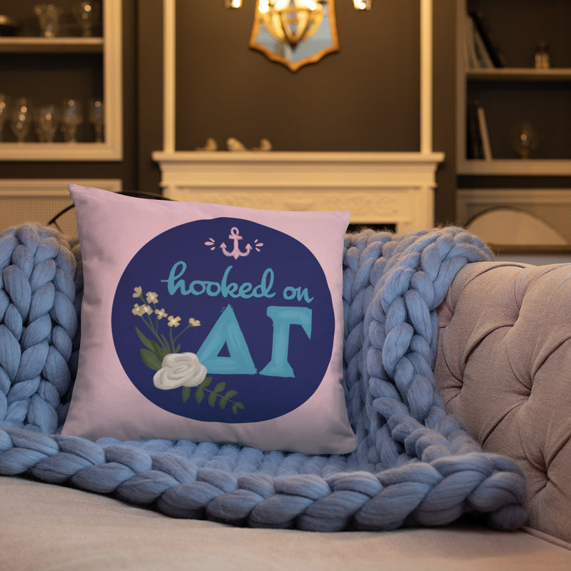 Delta Gamma Hooked on DG Sorority Pillow in pink shown on couch