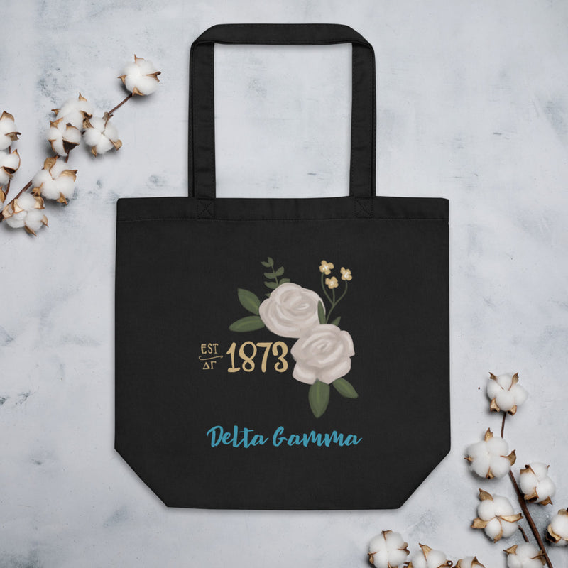 Delta Gamma 1873 Sorority Tote Bag shown in black with cotton blossoms