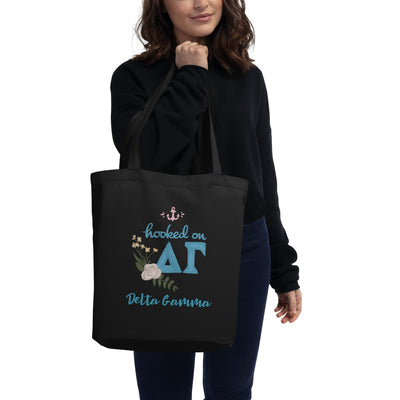 Delta Gamma Hooked on DG Sorority Tote Bag shown in black in woman's arm