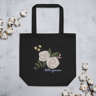 Delta Gamma Rose and Anchor Tote Bag in black shown with cotton blossoms