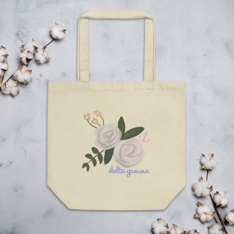 Delta Gamma Rose and Anchor Tote Bag shown in natural oyster color shown with cotton blossoms