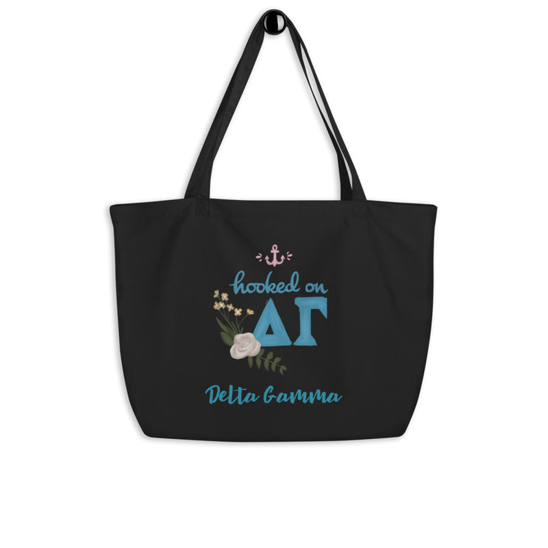 Delta Gamma Hooked on DG Sorority Tote Bag shown hanging on a hook