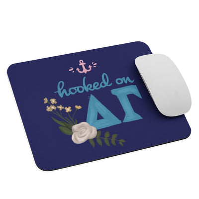 Delta Gamma Hooked on DG Mouse Pad in Navy Blue shown with mouse 