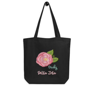 Delta Zeta Sorority Tote Bag shown in black hanging on a hook