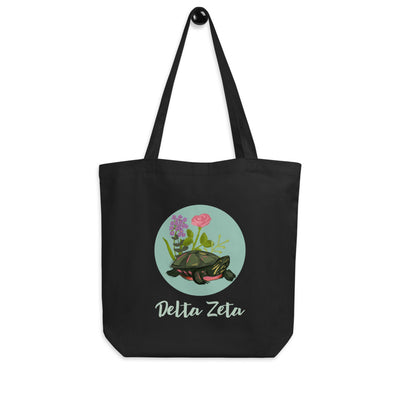 Delta Zeta Turtle Tote Bag in black shown hanging on hook