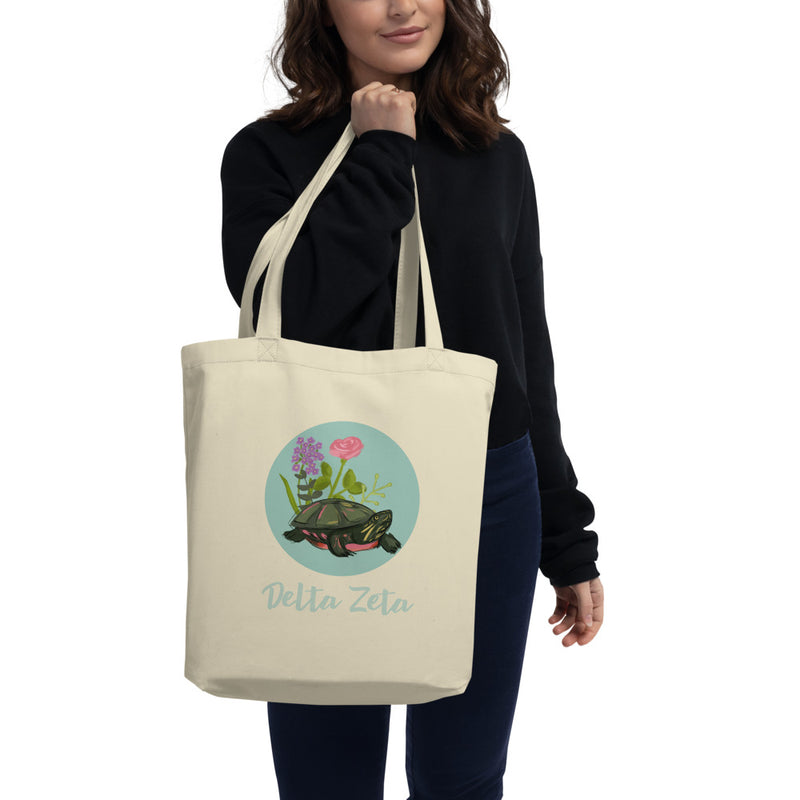 Delta Zeta Turtle Tote Bag in natural oyster shown on model&