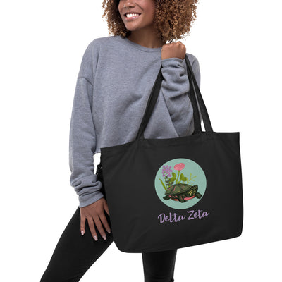 Delta Zeta Sorority Tote Bag with turtle mascot design shown on model's arm