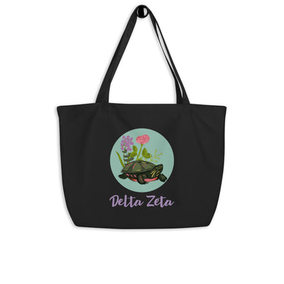 Delta Zeta Sorority Tote Bag shown in black hanging on hook in extra-large size