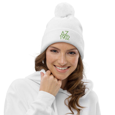 Delta Zeta Sorority Beanie in white with green embroidery shown on model