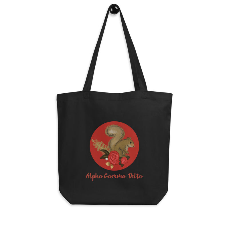 Alpha Gamma Delta Squirrel Mascot Circle Eco Tote Bag in black shown on a hook
