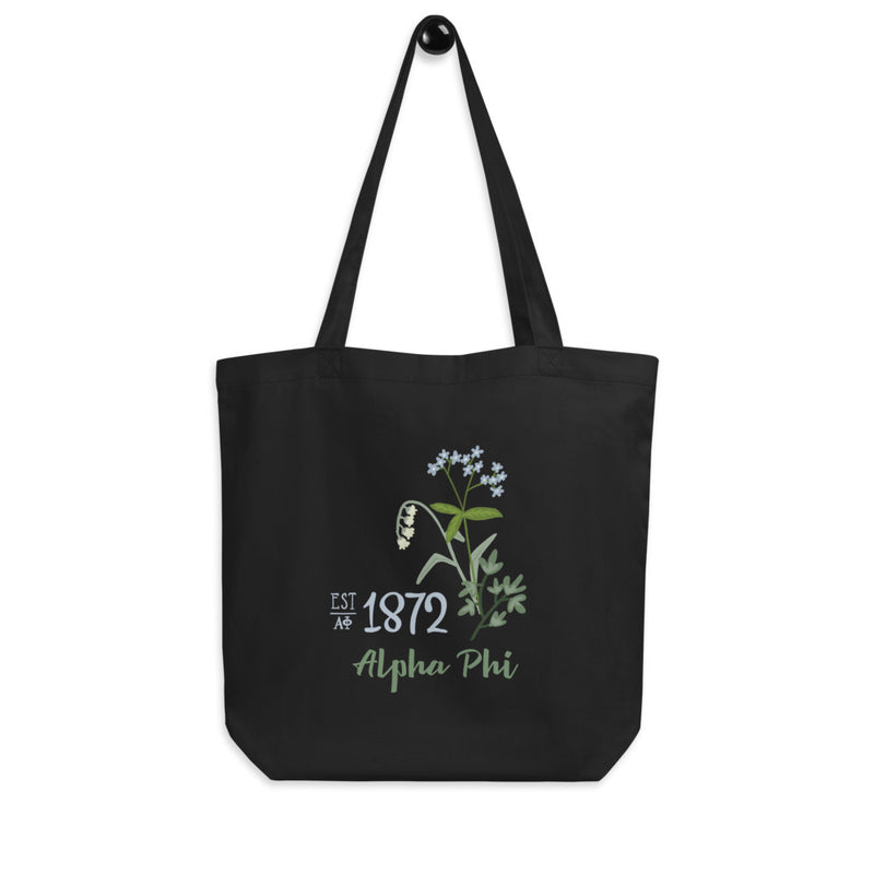 Alpha Phi 1872 Founders Day Eco Tote Bag in black shown on a hook