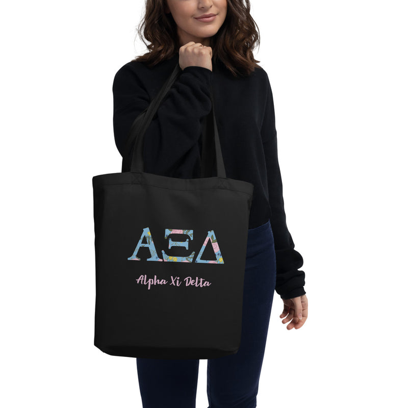 Alpha Xi Delta Greek Letters Eco Tote Bag in black on model&