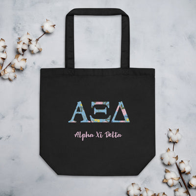 Alpha Xi Delta Greek Letters Eco Tote Bag in black with cotton flowers