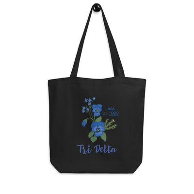 Tri Delta 1888 Founders Day Eco Tote Bag shown on a hook